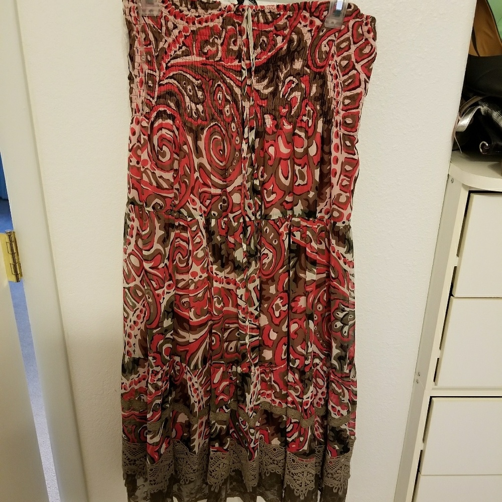 Can be worn as skirt or dress. Very cute